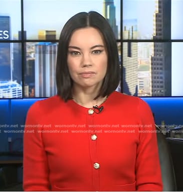 Jo Ling Kent’s red cardigan with gold buttons on CBS Evening News