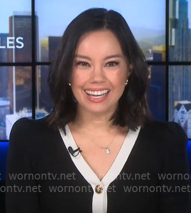 Jo Ling Kent's black cardigan with white trim on CBS Mornings