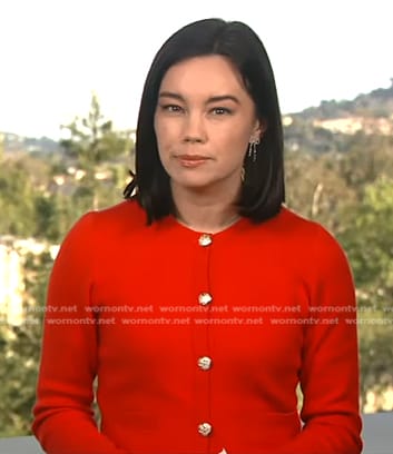 Jo Ling Kent’s red cardigan with gold buttons on CBS Evening News