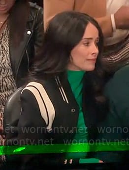 Julia's black and white bomber jacket on Extended Family