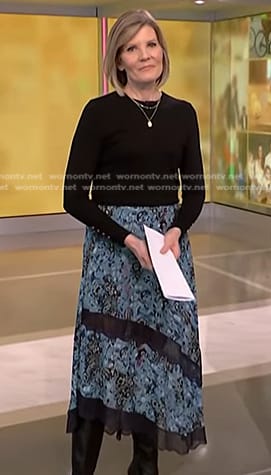 Kate’s black button cuff sweater and blue floral skirt on NBC News Daily