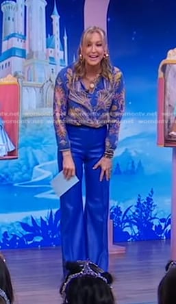 Lara’s blue feather print blouse and leather pants on Good Morning America