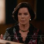 Margaret’s black floral blouse on So Help Me Todd