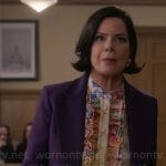 Margaret’s purple suit, floral ruffled blouse and yellow crystal earrings on So Help Me Todd