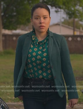 Mariana's green printed ruffle neck top on Good Trouble