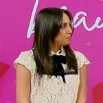 Neda Shaolian’s white lace contrast tie top on Tamron Hall Show