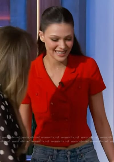 Nicola Peltz's red cropped cardigan on The Kelly Clarkson Show