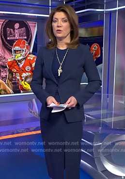 Norah’s navy blazer and skirt on CBS Evening News