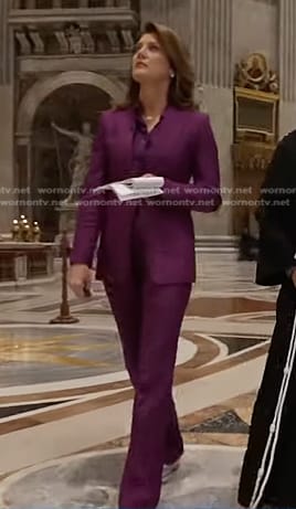 Norah’s purple tie neck blouse and suit on CBS Evening News