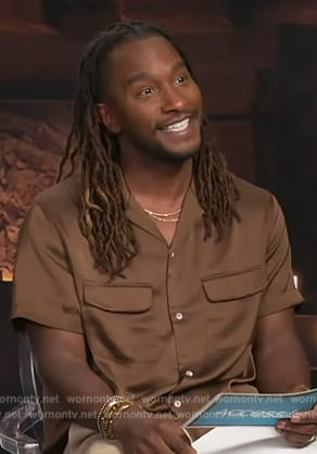 Scott’s brown satin shirt on Access Hollywood