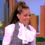 Sunny’s gray check vest and white ruffle blouse on The View