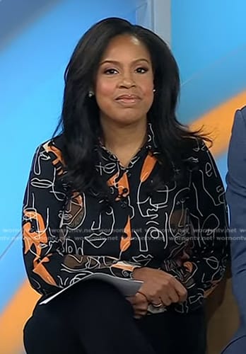 Sheinelle’s black face print blouse on Today