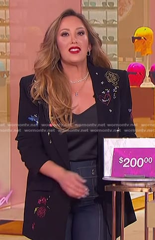 Cheryl Burke's black embroidered blazer and patch pocket jeans on The Jennifer Hudson Show