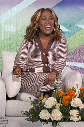 Sheryl’s brown houndstooth cardigan and skirt set on The Talk