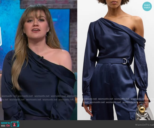 Kelly’s navy satin one shoulder top on The Kelly Clarkson Show