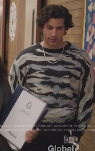 Simon's camo print sweater on Abbott Elementary