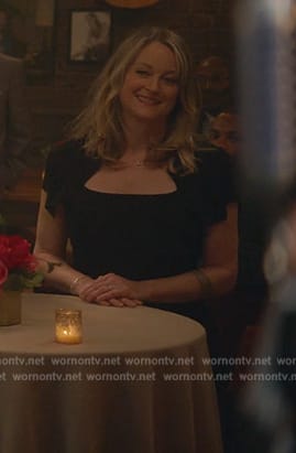 Stef's black asymmetric neck dress on Good Trouble