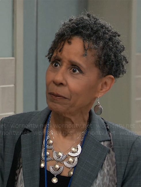 Stella's silver and gold necklace and round earrings on General Hospital