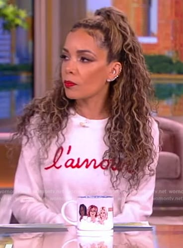 Sunny’s white l’amour print sweater on The View