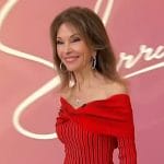 Susan Lucci’s red contrast pleated off shoulder top on Sherri