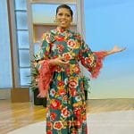 Tamron’s green floral print top with feather trim on Tamron Hall Show