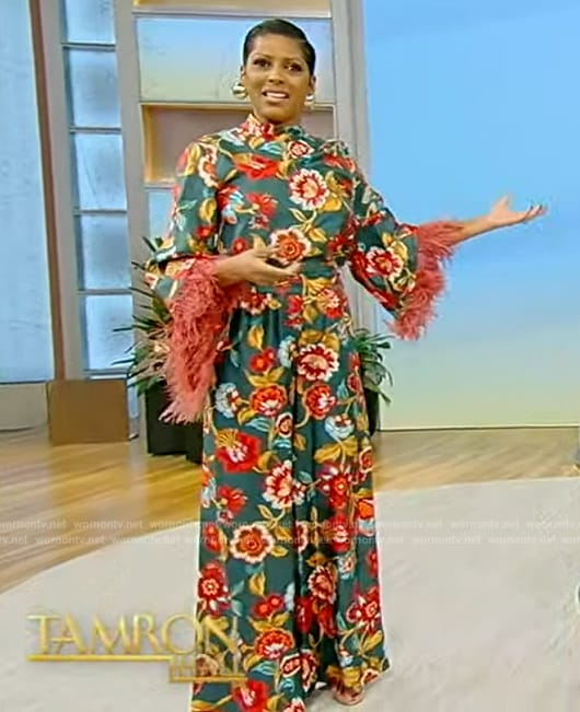 Tamron's green floral print top with feather trim on Tamron Hall Show