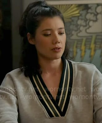 Violet's grey striped trim v-neck sweatshirt on Chicago Fire