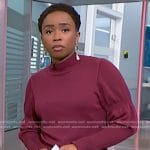 Zinhle’s burgundy sweater on NBC News Daily