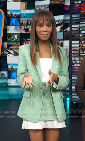 Zuri's green tweed blazer and skirt on Access Hollywood