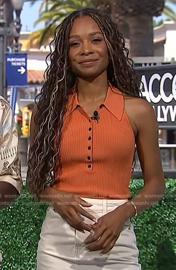 Zuri’s orange ribbed top on Access Hollywood