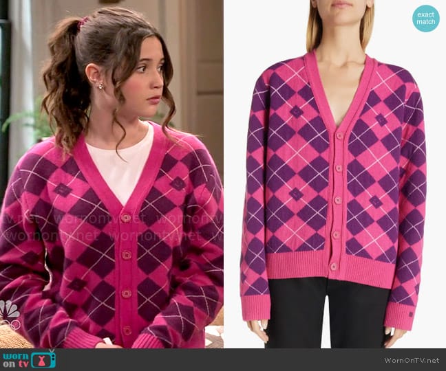 Grace’s pink argyle cardigan on Extended Family