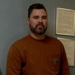 Adam’s rust brown sweatshirt on Chicago PD