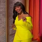 Angela Bassett’s neon asymmetric top and pants on Sherri