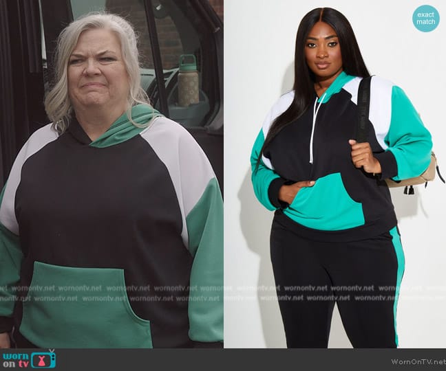 Ashley Stewart Colorblock Stretch Knit Hoodie worn by Gloria McManus (Paula Pell) on Girls5eva