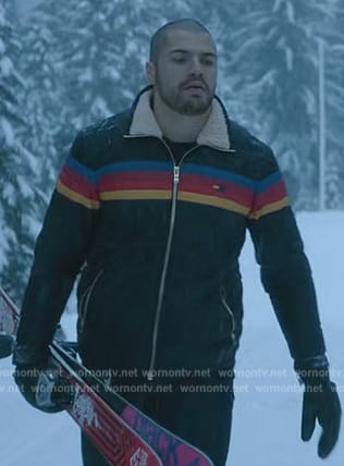 Jules’ black rainbow stripe puffer jacket on Death and Other Details