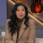 Awkwafina’s beige pinstripe blazer and skort on The Kelly Clarkson Show