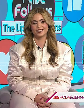 Christina Basias’s white satin bomber jacket and cargo pants on Today