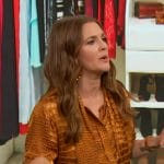 Drew’s orange crock skin satin blouse on The Drew Barrymore Show