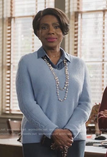 Barbara's blue cable knit sweater on Abbott Elementary