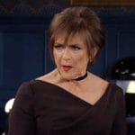 Jordan’s black asymmetric neckline dress on The Young and the Restless