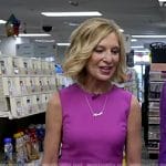 Karen S. Lynch’s pink sleeveless midi dress on CBS Evening News