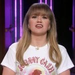 Kelly’s Johnny Cash graphic tee and skirt on The Kelly Clarkson Show