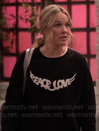 Kristen's Peace Love sweatshirt on Extended Family