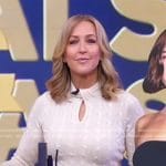 Lara’s ivory cable knit twist neck sweater on Good Morning America