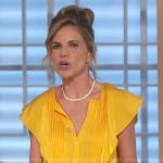 Natalie’s yellow ruffled top on The Talk