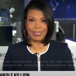 Nikole Killion’s navy jacket with white trims on CBS Mornings