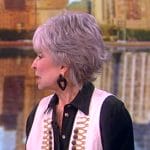 Rita Moreno’s white embroidered vest on The View