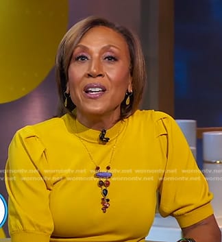 Robin’s yellow puff sleeve sweater on Good Morning America