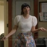 Sam’s white pointelle knit top and floral skirt on Not Dead Yet