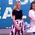 Sara’s black top and floral pleated skirt on The View